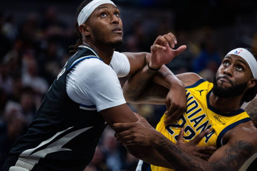 Milwaukee Bucks center/forward Myles Turner (3) and Indiana Pacers forward Isaiah Jackson (22) fight for position in the first half at Gainbridge Fieldhouse.
