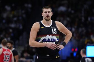 Denver, Colorado, USA; Denver Nuggets center Nikola Jokic (15) during the first quarter against the Chicago Bulls at Ball Arena. Mandatory Credit: Ron Chenoy-Imagn Images