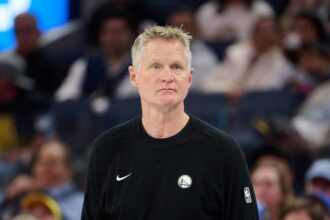 Golden State Warriors head coach Steve Kerr watches game play against the Portland Trail Blazers during the third quarter at Chase Center.
