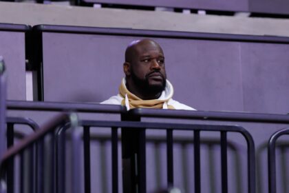Gainesville, Florida, USA; Former NBA player Shaquille O'Neal sits courtside during the first half between the Florida Gators and the LSU Tigers at Exactech Arena at the Stephen C. O'Connell Center. Mandatory Credit: Matt Pendleton-Imagn Images