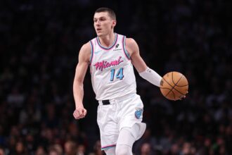 Brooklyn, New York, USA; Miami Heat guard Tyler Herro (14) dribbles up court during the second half against the Brooklyn Nets at Barclays Center. Mandatory Credit: Vincent Carchietta-Imagn Images