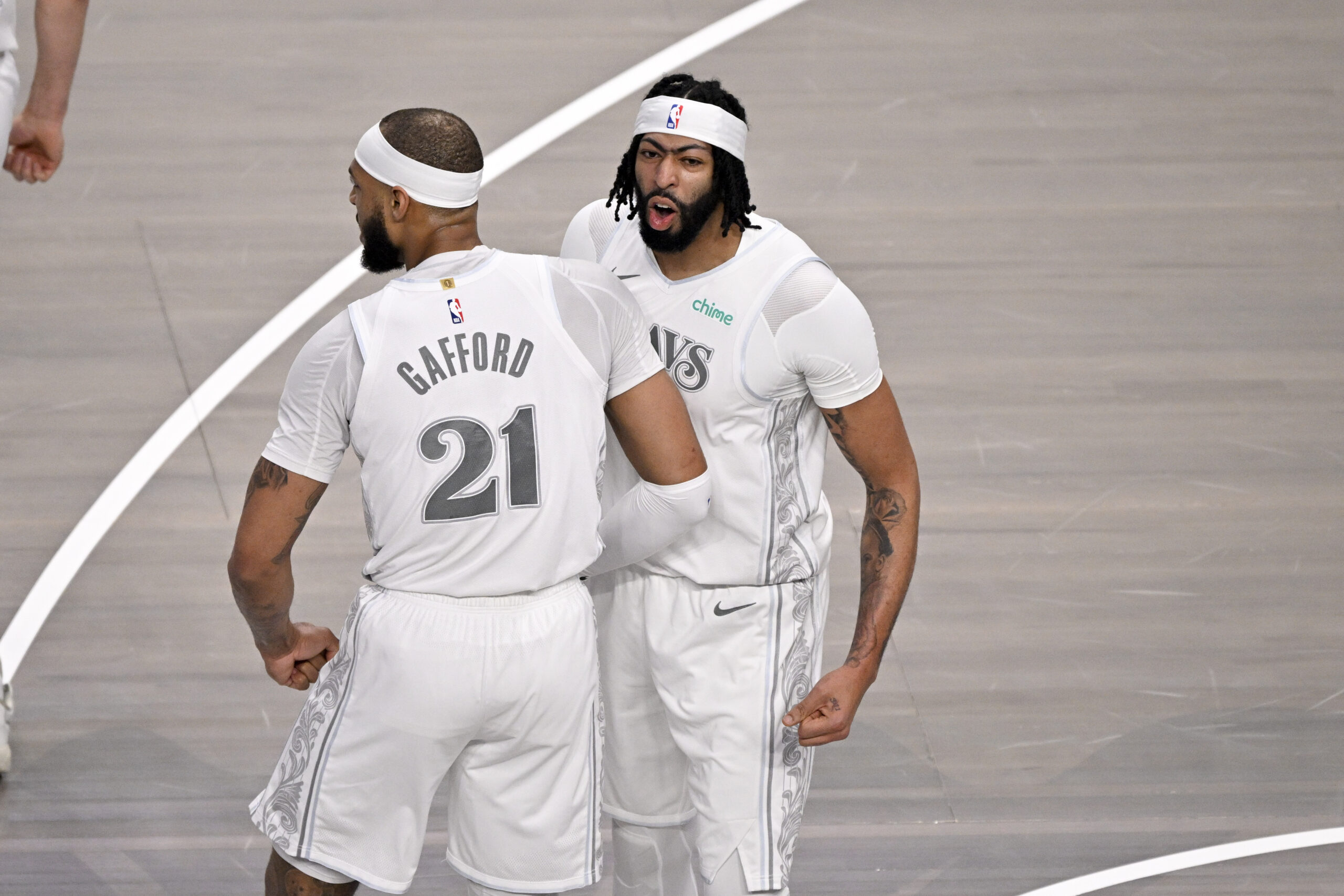 Feb 8, 2025; Dallas, Texas, USA; Dallas Mavericks forward Anthony Davis (3) and center Daniel Gafford (21) celebrates after Davis dunks the ball during the game between the Dallas Mavericks and the Houston Rockets at the American Airlines Center. Mandatory Credit: Jerome Miron-Imagn Images