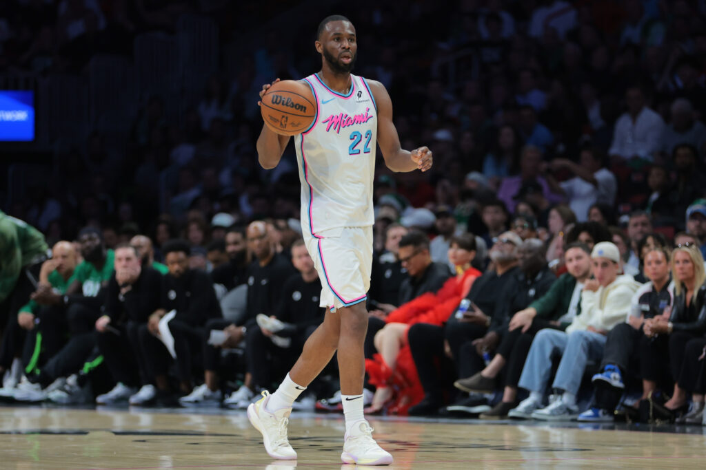 Feb 10, 2025; Miami, Florida, USA; Miami Heat forward Andrew Wiggins (22) dribbles the basketball against the Boston Celtics during the second quarter at Kaseya Center. Mandatory Credit: Sam Navarro-Imagn Images