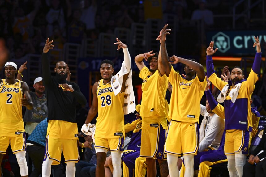 Apr 11, 2025; Los Angeles, California, USA; Los Angeles Lakers forward Jarred Vanderbilt (2), forward LeBron James (23), forward Rui Hachimura (28), center Jaxson Hayes (11), and Los Angeles Lakers guard Gabe Vincent (7) celebrate after scoring against the Houston Rockets during the second half at Crypto.com Arena. Mandatory Credit: Jonathan Hui-Imagn Images