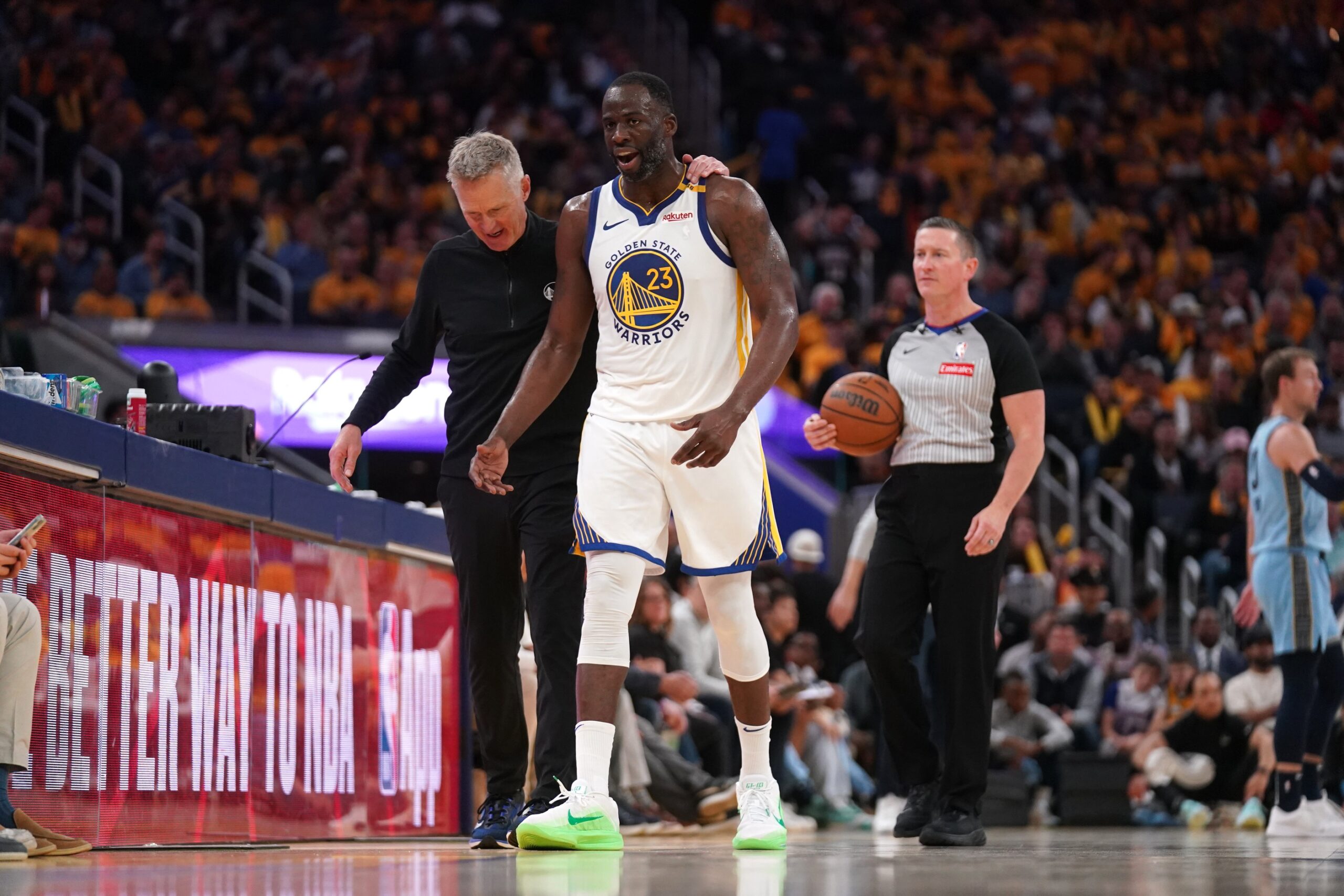 Apr 15, 2025; San Francisco, California, USA; Golden State Warriors forward Draymond Green (23) walks towards the team bench with head coach Steve Kerr after a play against the Memphis Grizzlies in the third quarter at the Chase Center. Mandatory Credit: Cary Edmondson-Imagn Images