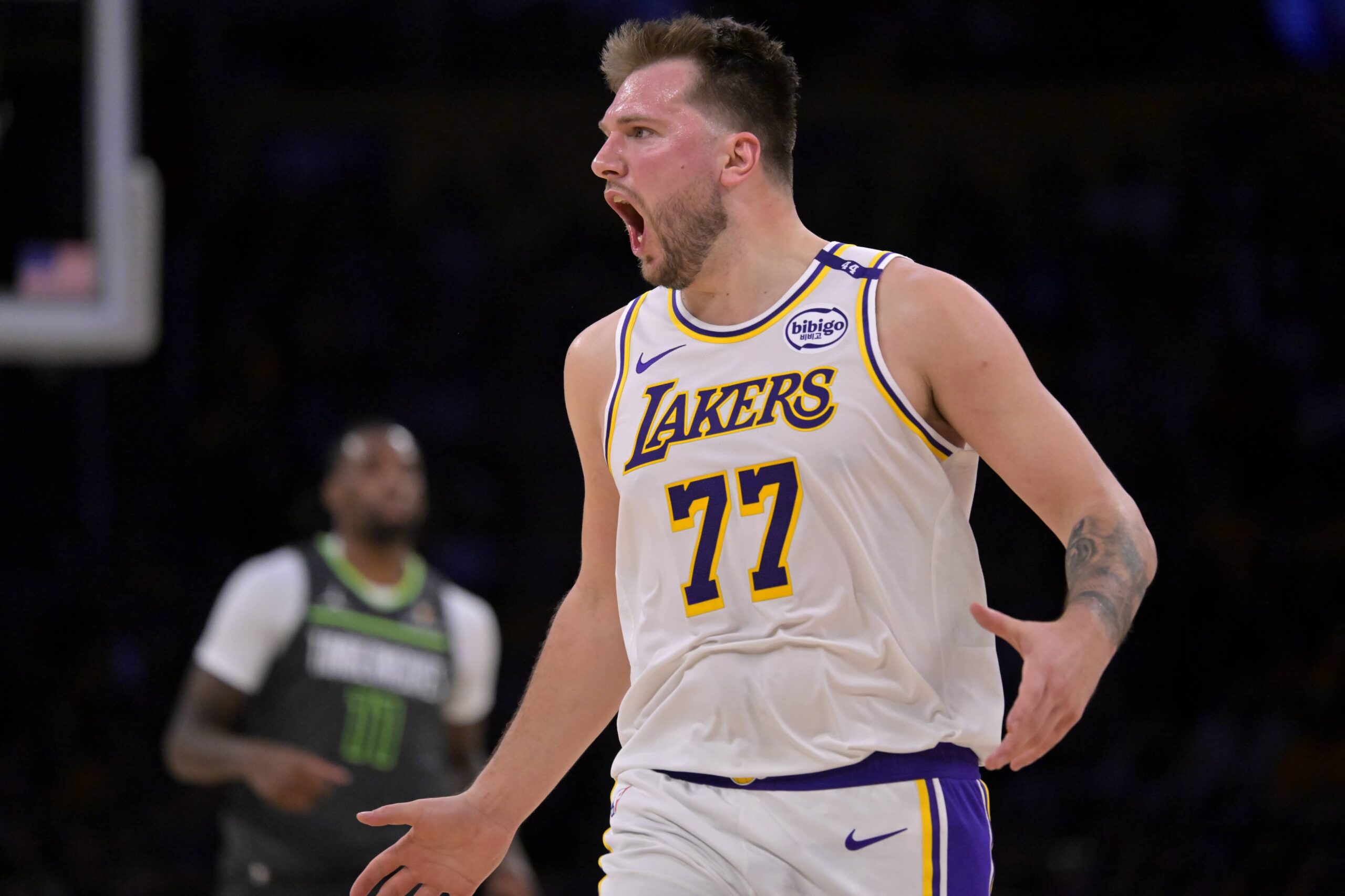 Apr 19, 2025; Los Angeles, California, USA; Los Angeles Lakers guard Luka Doncic (77) reacts after not getting a foul call in the second half against the Minnesota Timberwolves at Crypto.com Arena. Mandatory Credit: Jayne Kamin-Oncea-Imagn Images