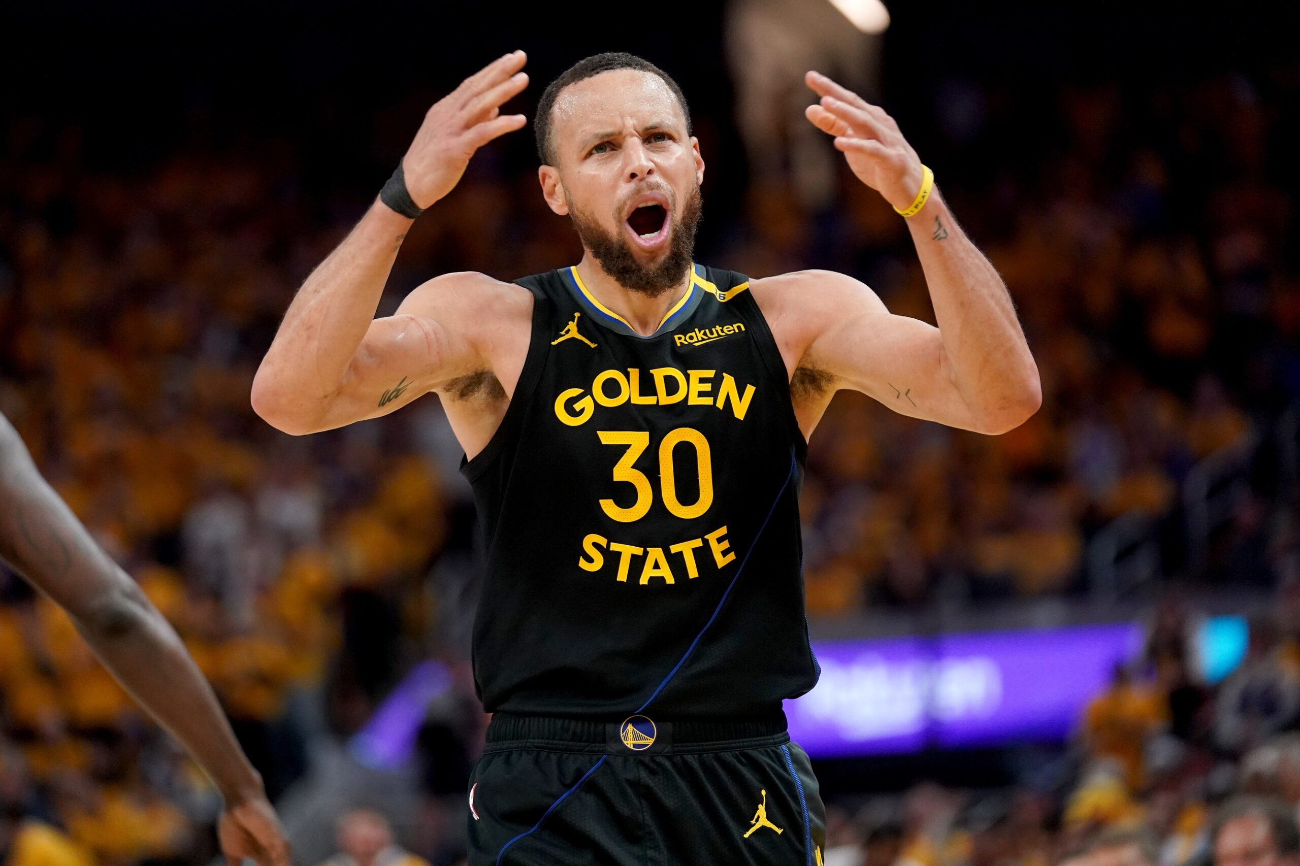 May 2, 2025; San Francisco, California, USA; Golden State Warriors guard Stephen Curry (30) reacts after being fouled against the Houston Rockets in the third quarter of game six of the first round for the 2025 NBA Playoffs at Chase Center. Mandatory Credit: Cary Edmondson-Imagn Images