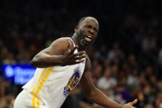 Phoenix, Arizona, USA; Golden State Warriors forward Draymond Green (23) reacts against the Phoenix Suns at Footprint Center. Mandatory Credit: Mark J. Rebilas-Imagn Images