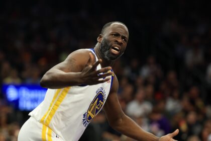 Phoenix, Arizona, USA; Golden State Warriors forward Draymond Green (23) reacts against the Phoenix Suns at Footprint Center. Mandatory Credit: Mark J. Rebilas-Imagn Images