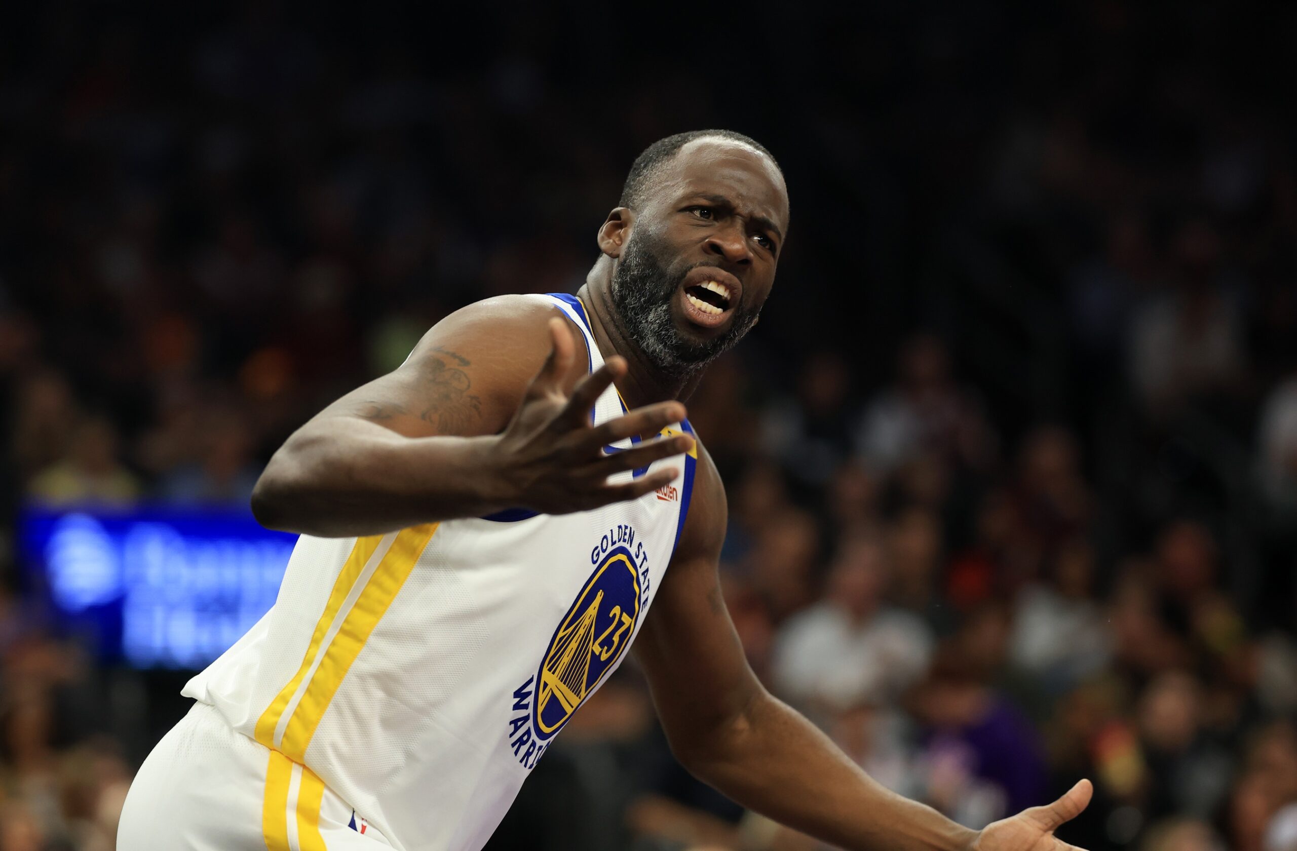Phoenix, Arizona, USA; Golden State Warriors forward Draymond Green (23) reacts against the Phoenix Suns at Footprint Center. Mandatory Credit: Mark J. Rebilas-Imagn Images