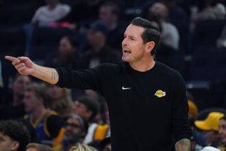 Oct 5, 2025; San Francisco, California, USA; Los Angeles Lakers head coach JJ Redick coaches his team against the Golden State Warriors in the first quarter at Chase Center. Mandatory Credit: David Gonzales-Imagn Images