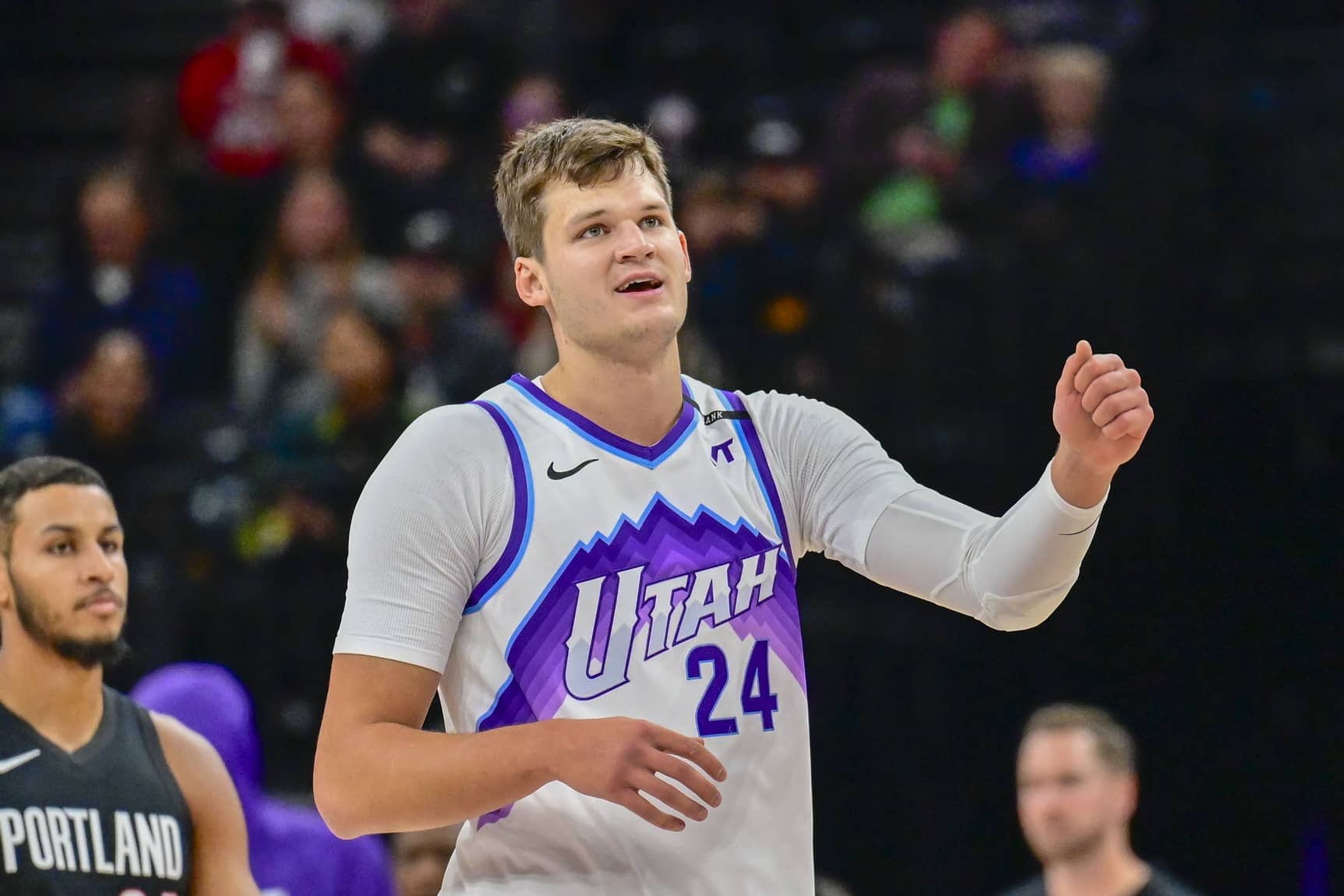 Salt Lake City, Utah, USA; Utah Jazz center Walker Kessler (24) smiles after making a great play during the first half against the Portland Trail Blazers at Delta Center. Mandatory Credit: Peter Creveling-Imagn Images