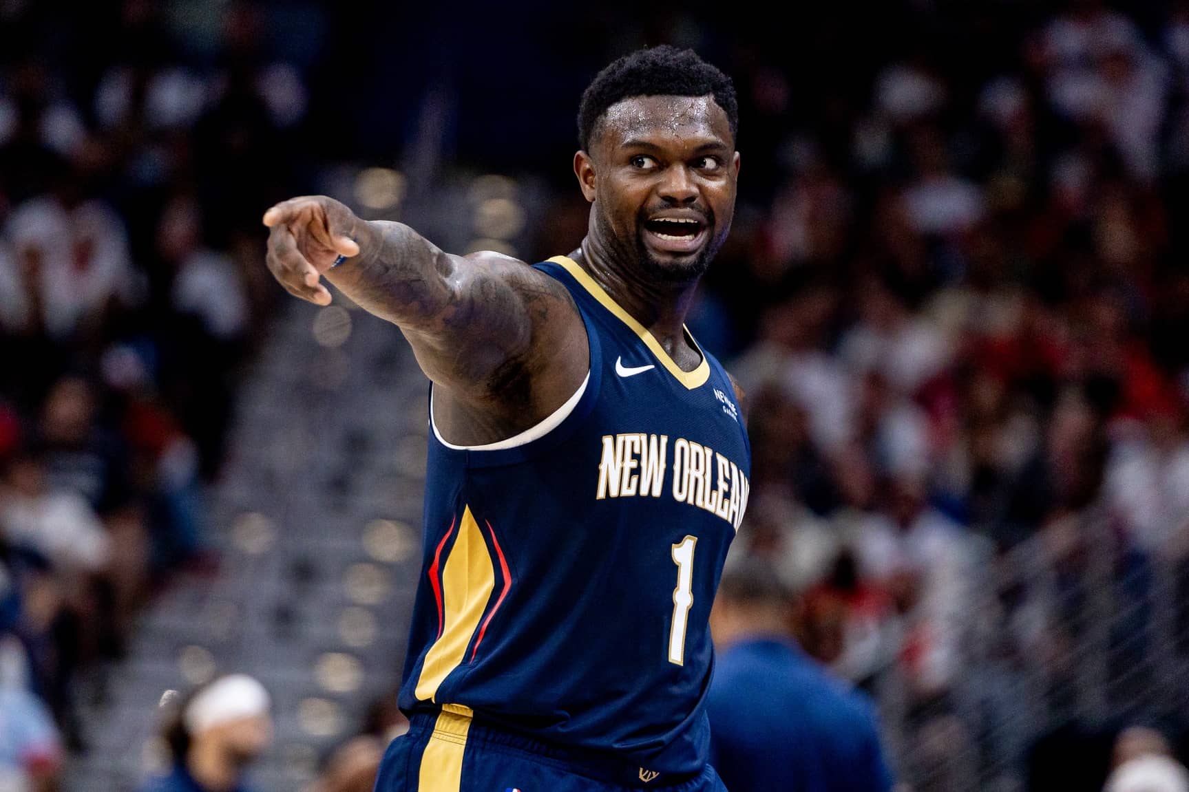 Oct 24, 2025; New Orleans, Louisiana, USA; New Orleans Pelicans forward Zion Williamson (1) reacts to a play against the San Antonio Spurs during the second half at Smoothie King Center. Mandatory Credit: Stephen Lew-Imagn Images