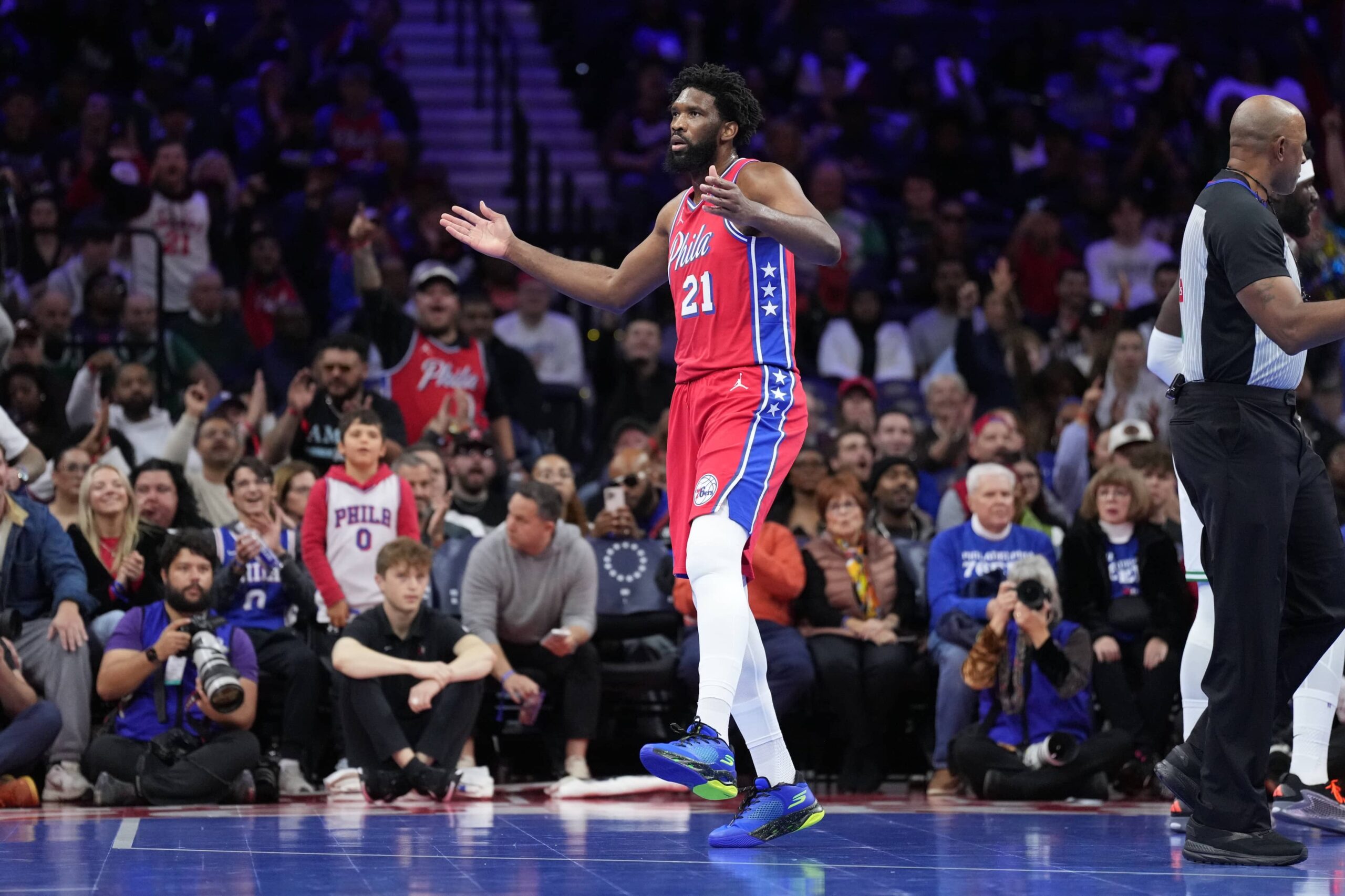 Oct 31, 2025; Philadelphia, Pennsylvania, USA; Philadelphia 76ers center Joel Embiid (21) reacts against the Boston Celtics in the first quarter at Xfinity Mobile Arena. Mandatory Credit: Kyle Ross-Imagn Images