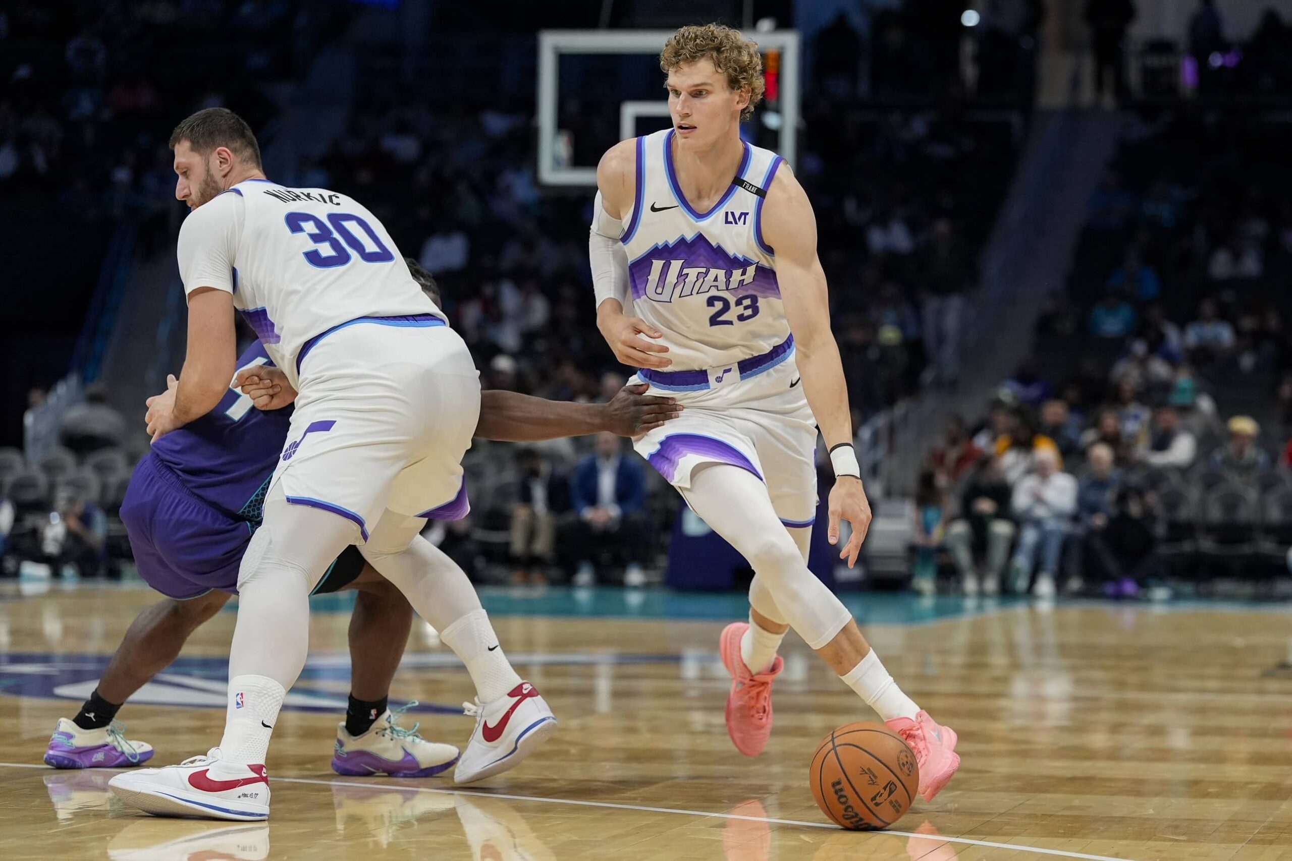 Nov 2, 2025; Charlotte, North Carolina, USA; Utah Jazz forward Lauri Markkanen (23) handles the ball against the Charlotte Hornets during the second half at Spectrum Center. Mandatory Credit: Jim Dedmon-Imagn Images