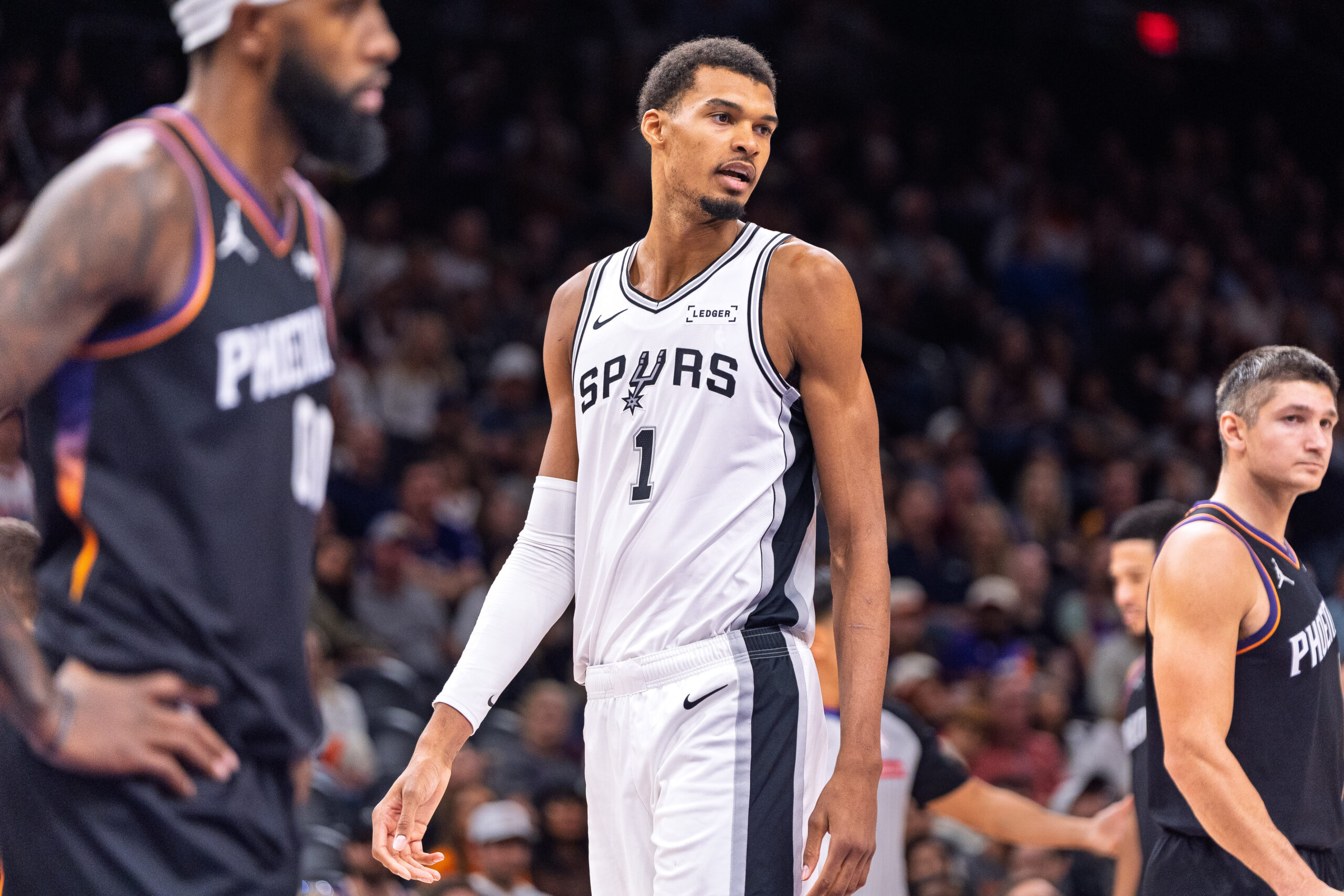 Nov 2, 2025; Phoenix, Arizona, USA; San Antonio Spurs forward Victor Wembanyama (1) reacts after a drawing a foul in the second half against the Phoenix Suns at Mortgage Matchup Center. Mandatory Credit: Allan Henry-Imagn Images