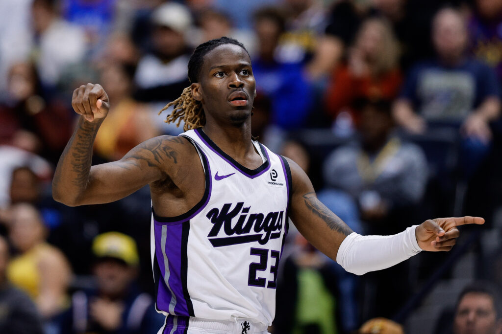 Nov 3, 2025; Denver, Colorado, USA; Sacramento Kings guard Keon Ellis (23) reacts after a basket in the third quarter against the Denver Nuggets at Ball Arena. Mandatory Credit: Isaiah J. Downing-Imagn Images