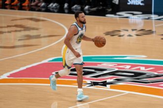 Nov 12, 2025; San Antonio, Texas, USA; Golden State Warriors guard Stephen Curry (30) dribbles up the court in the second half at Frost Bank Center. Mandatory Credit: Daniel Dunn-Imagn Images