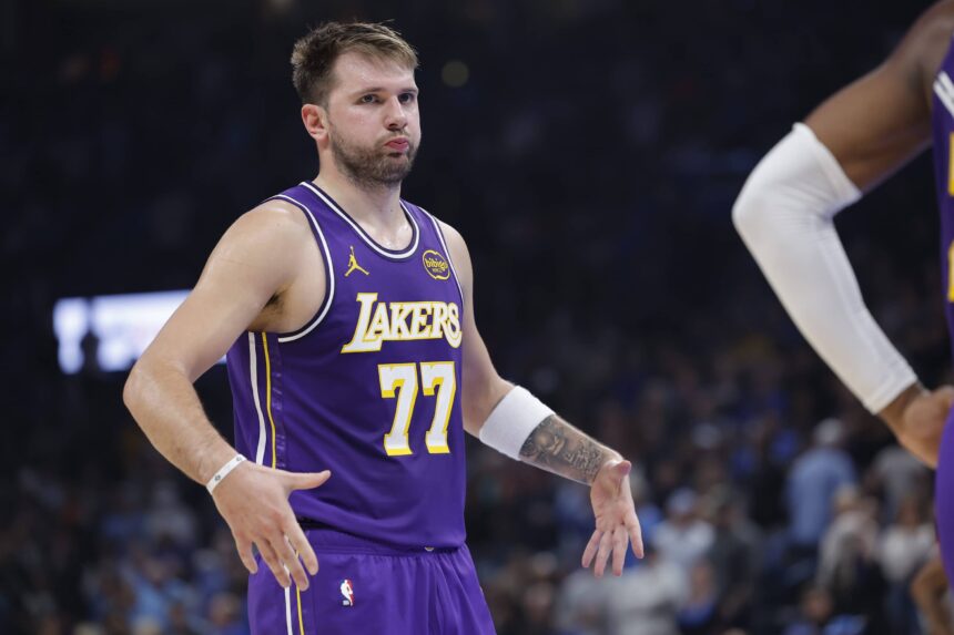 Nov 12, 2025; Oklahoma City, Oklahoma, USA; Los Angeles Lakers guard Luka Doncic reacts to a fan during the second quarter of a game against the Oklahoma City Thunder at Paycom Center. Mandatory Credit: Alonzo Adams-Imagn Images