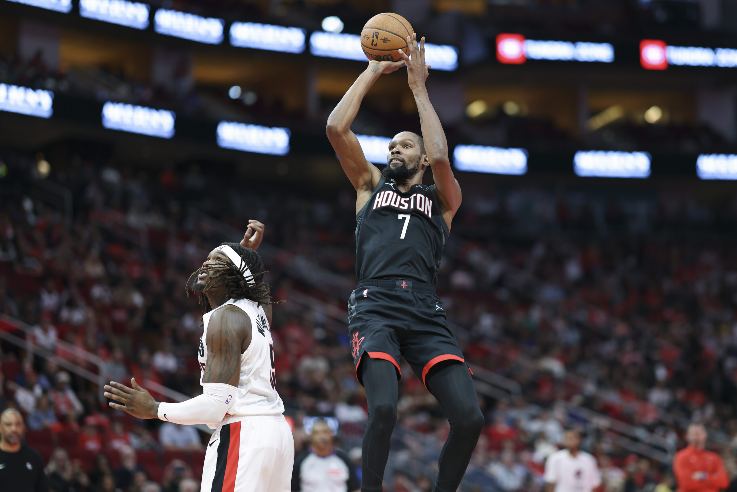 Nov 14, 2025; Houston, Texas, USA; Houston Rockets forward Kevin Durant (7) shoots the ball over Portland Trail Blazers center Robert Williams III (35) during the second quarter at Toyota Center. Mandatory Credit: Troy Taormina-Imagn Images
