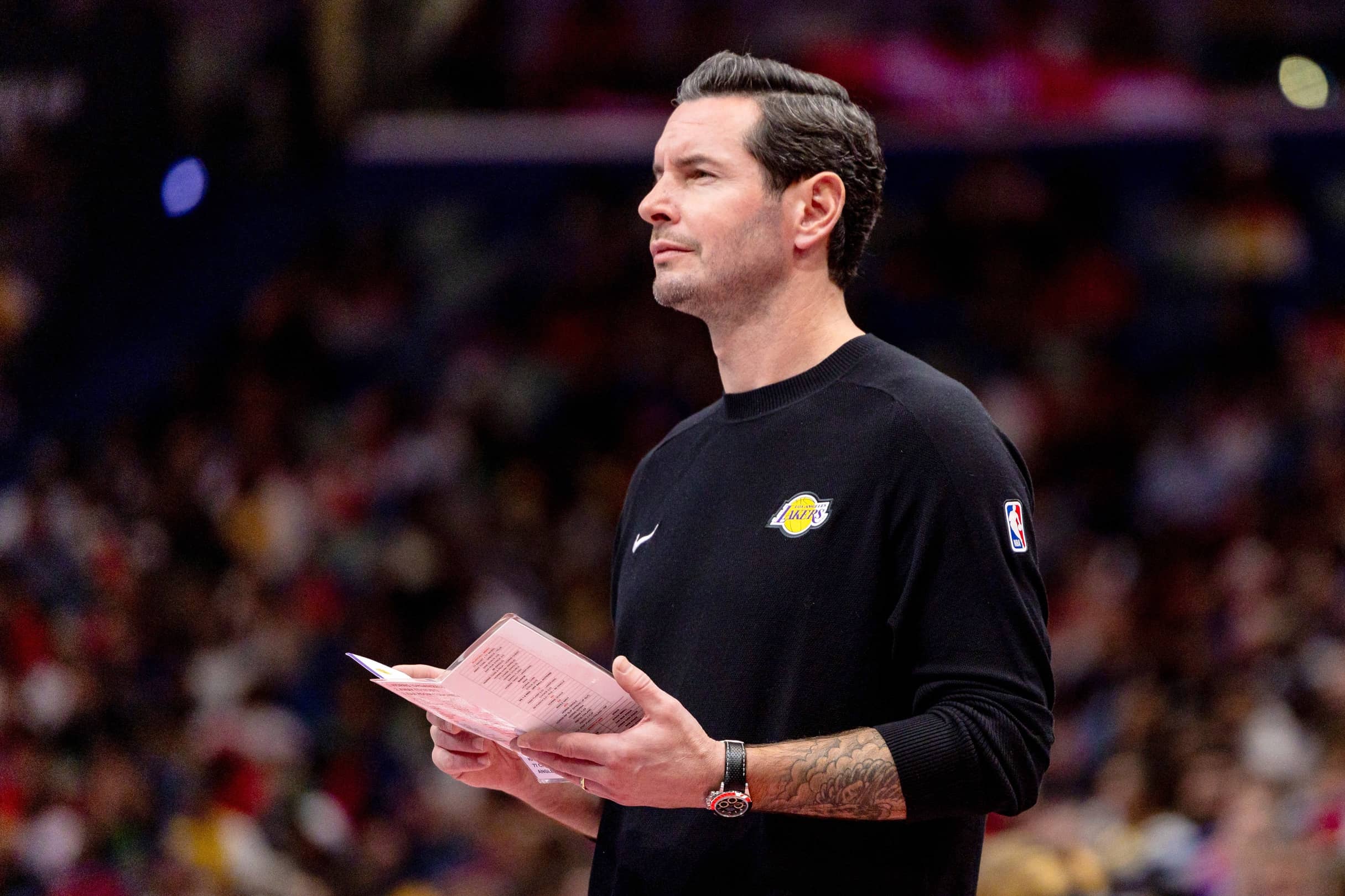 Nov 14, 2025; New Orleans, Louisiana, USA; Los Angeles Lakers Head Coach JJ Redick looks on against the New Orleans Pelicans during the second half at Smoothie King Center. Mandatory Credit: Stephen Lew-Imagn Images
