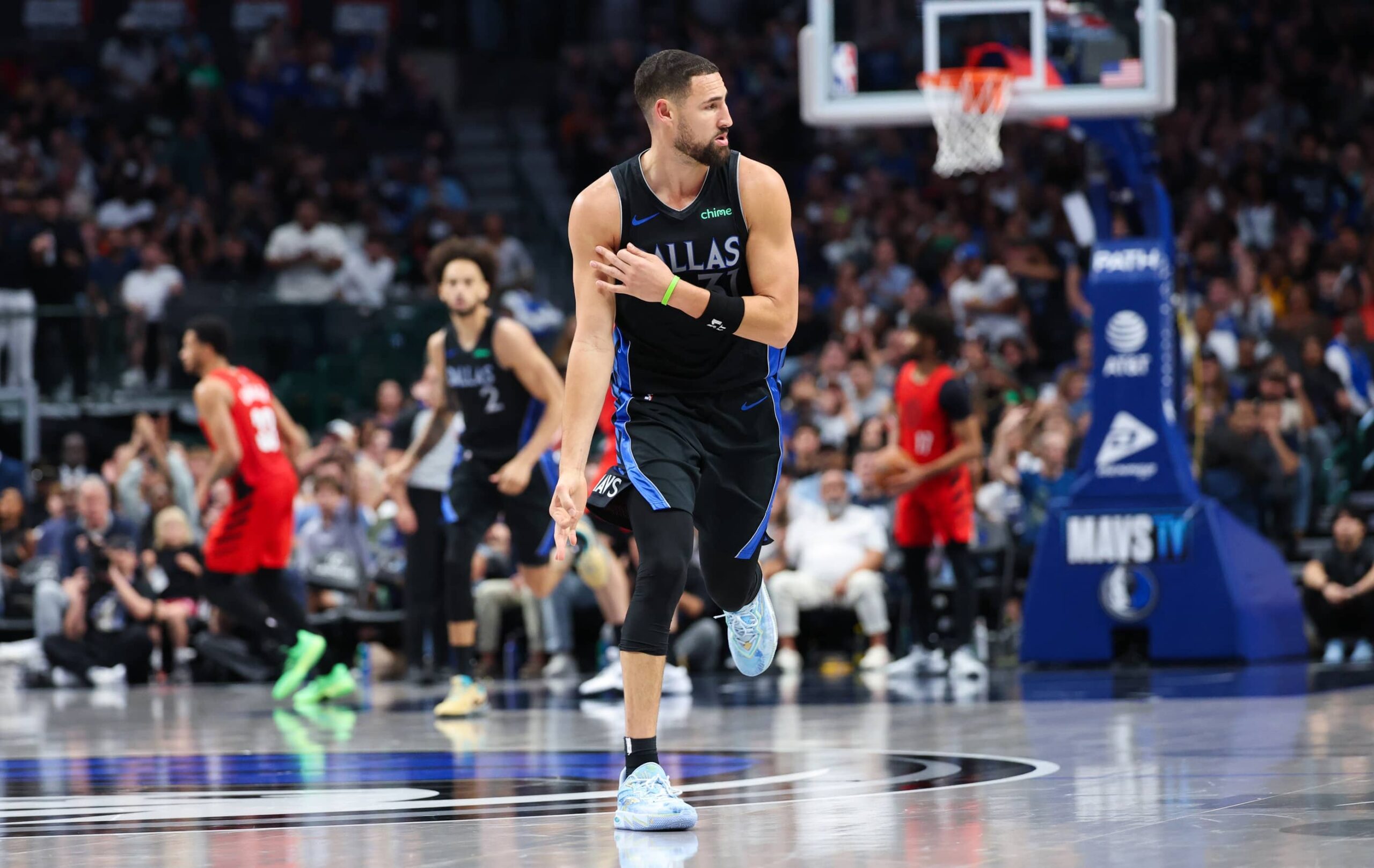 Nov 16, 2025; Dallas, Texas, USA; Dallas Mavericks guard Klay Thompson (31) reacts after scoring during the second half against the Portland Trail Blazers at American Airlines Center. Mandatory Credit: Kevin Jairaj-Imagn Images