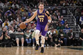 Milwaukee, Wisconsin, USA; Los Angeles Lakers guard Luka Doncic (77) during the game against the Milwaukee Bucks at Fiserv Forum. Mandatory Credit: Jeff Hanisch-Imagn Images