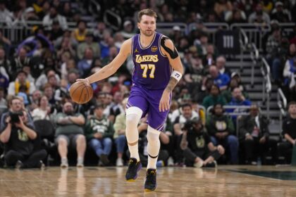 Milwaukee, Wisconsin, USA; Los Angeles Lakers guard Luka Doncic (77) during the game against the Milwaukee Bucks at Fiserv Forum. Mandatory Credit: Jeff Hanisch-Imagn Images
