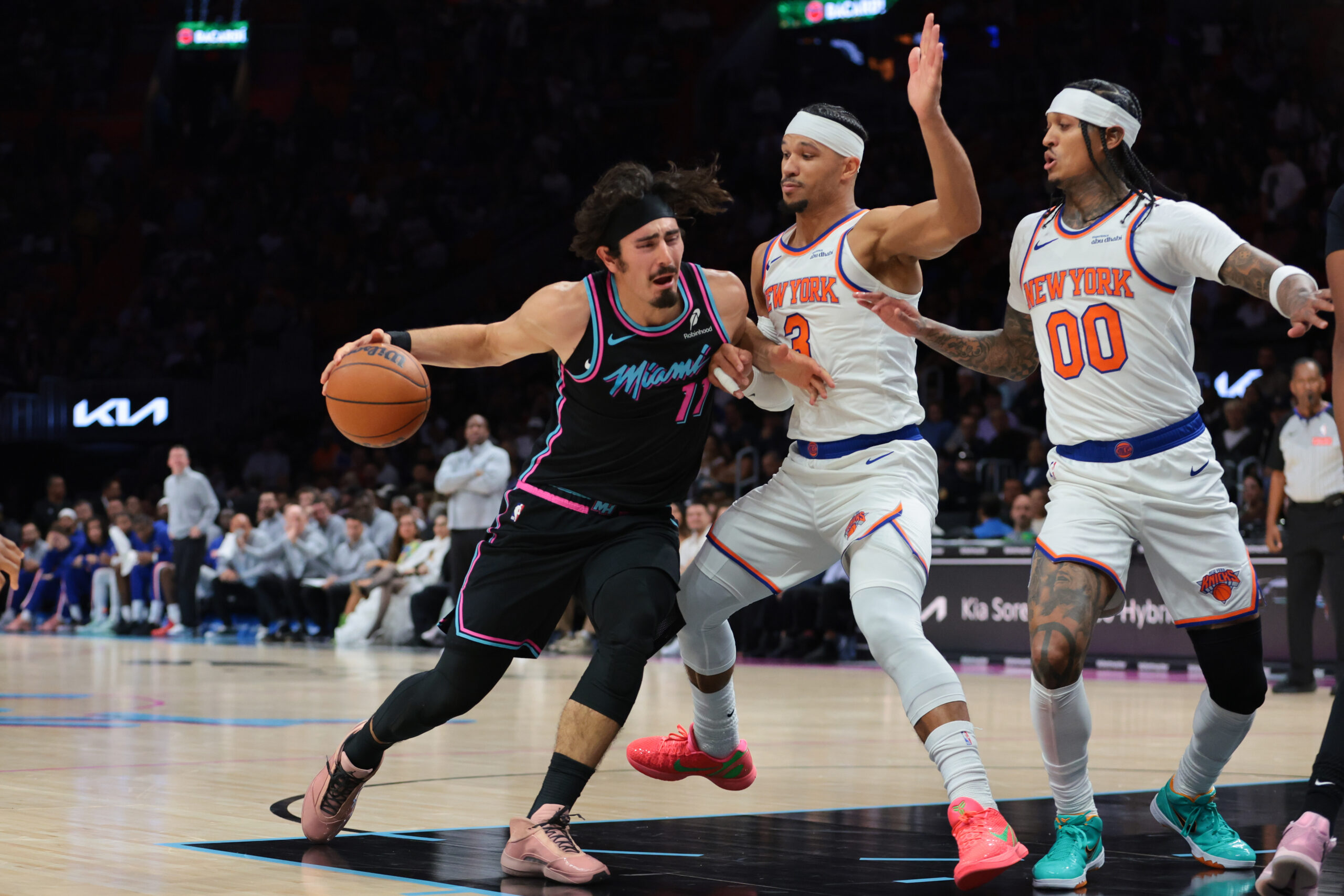 Nov 17, 2025; Miami, Florida, USA; Miami Heat forward Jaime Jaquez Jr. (11) drives to the basket against New York Knicks guard Josh Hart (3) during the second quarter at Kaseya Center. Mandatory Credit: Sam Navarro-Imagn Images