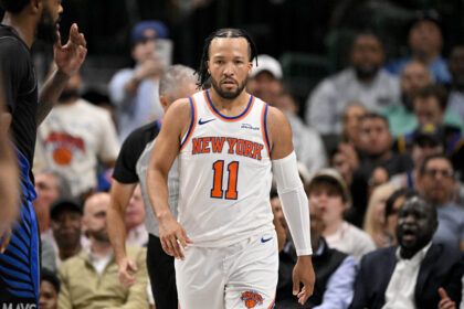 Dallas, Texas, USA; New York Knicks guard Jalen Brunson (11) looks on during the second quarter against the Dallas Mavericks at the American Airlines Center. Mandatory Credit: Jerome Miron-Imagn Images