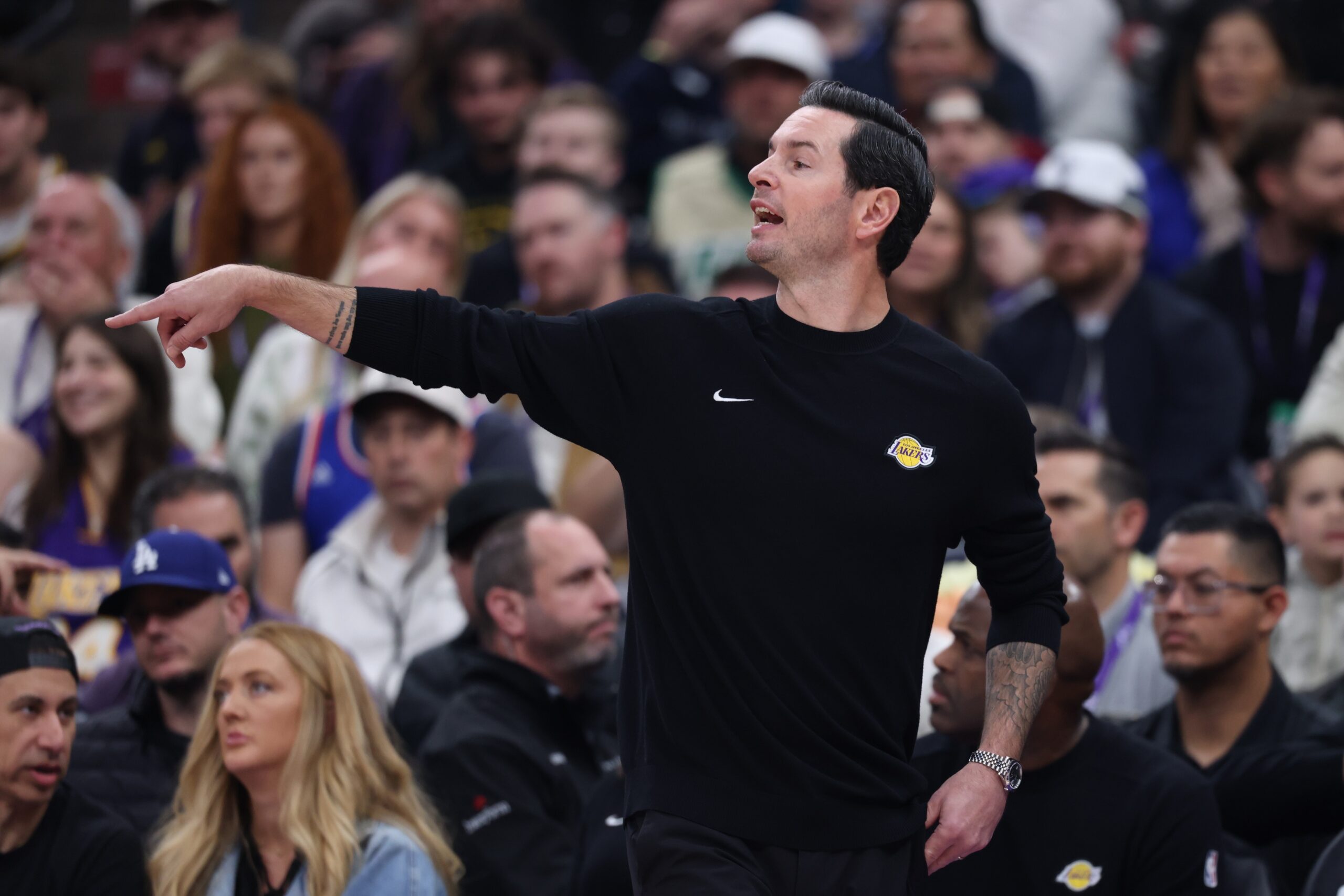 Nov 23, 2025; Salt Lake City, Utah, USA; Los Angeles Lakers head coach JJ Redick gives instructions during the first half of the game against the Utah Jazz at Delta Center. Mandatory Credit: Rob Gray-Imagn Images