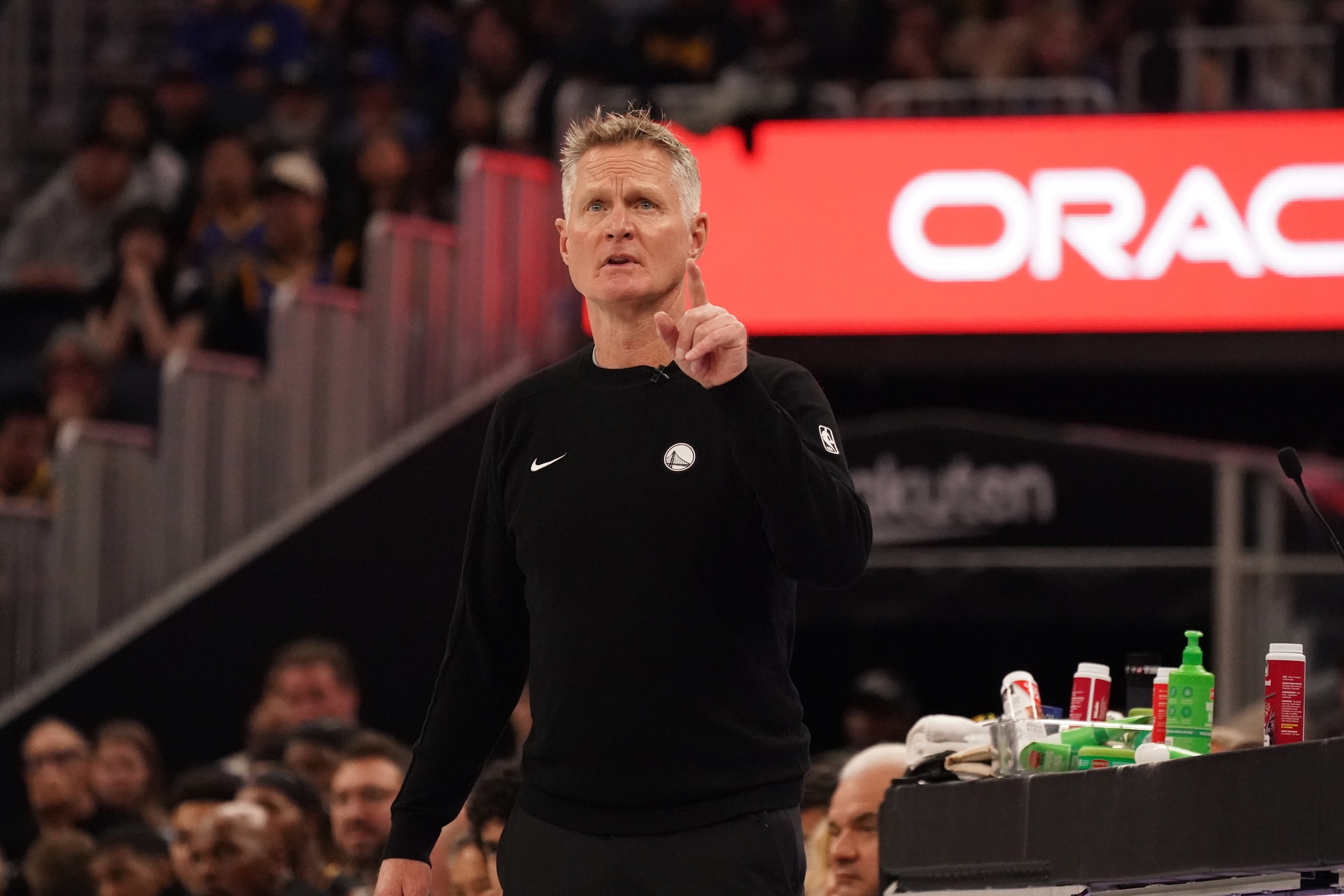 Nov 26, 2025; San Francisco, California, USA; Golden State Warriors head coach Steve Kerr watches the scoreboard against the Houston Rockets in the second quarter at Chase Center. Mandatory Credit: David Gonzales-Imagn Images