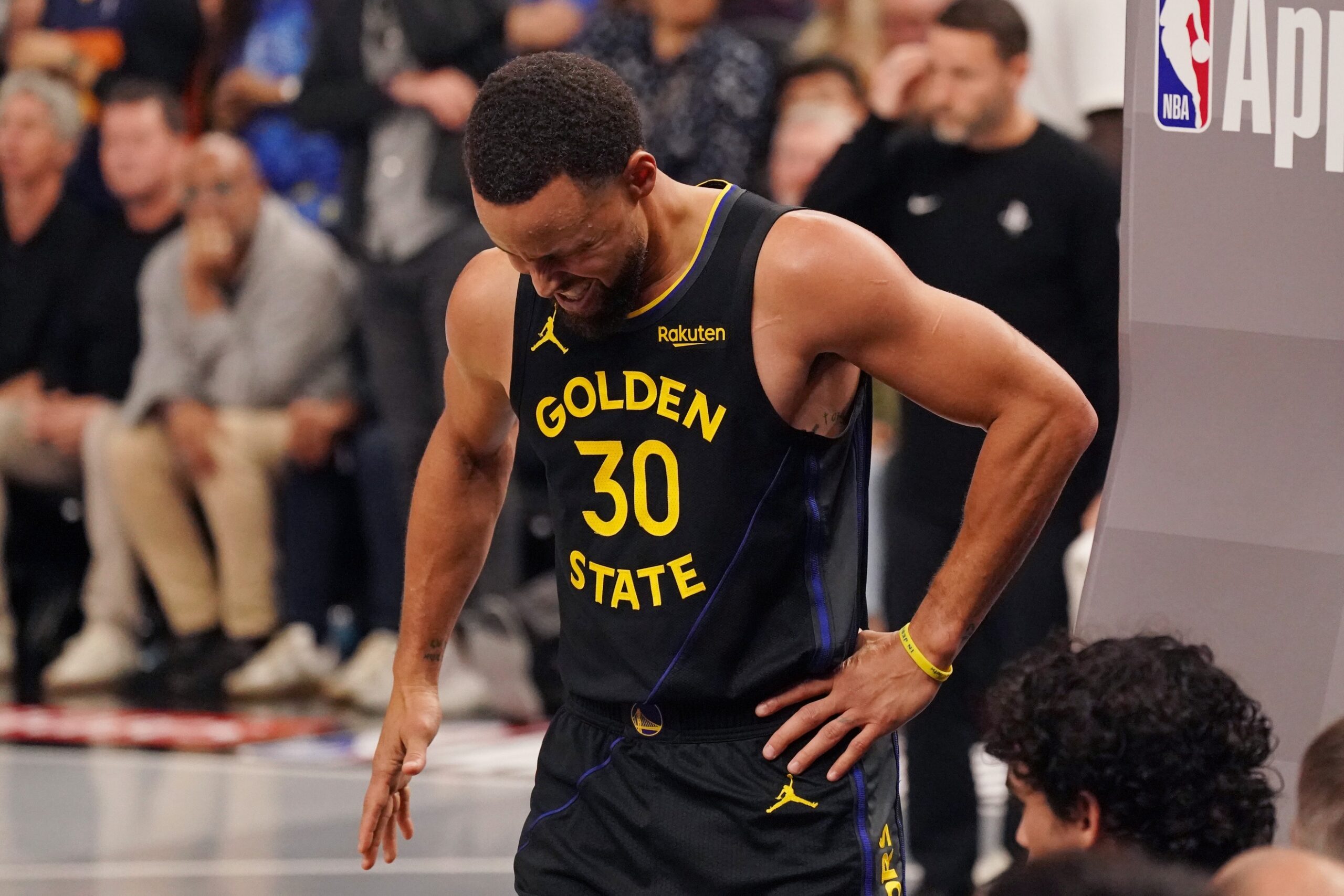 Nov 26, 2025; San Francisco, California, USA; Golden State Warriors guard Stephen Curry (30) gets up injured after a play against the Houston Rockets in the fourth quarter at Chase Center. Mandatory Credit: David Gonzales-Imagn Images