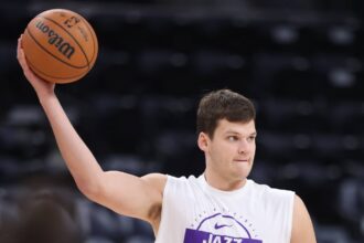 Utah Jazz center Walker Kessler (24) warms up before the game against the Phoenix Suns at Delta Center. Mandatory Credit: Rob Gray-Imagn Images