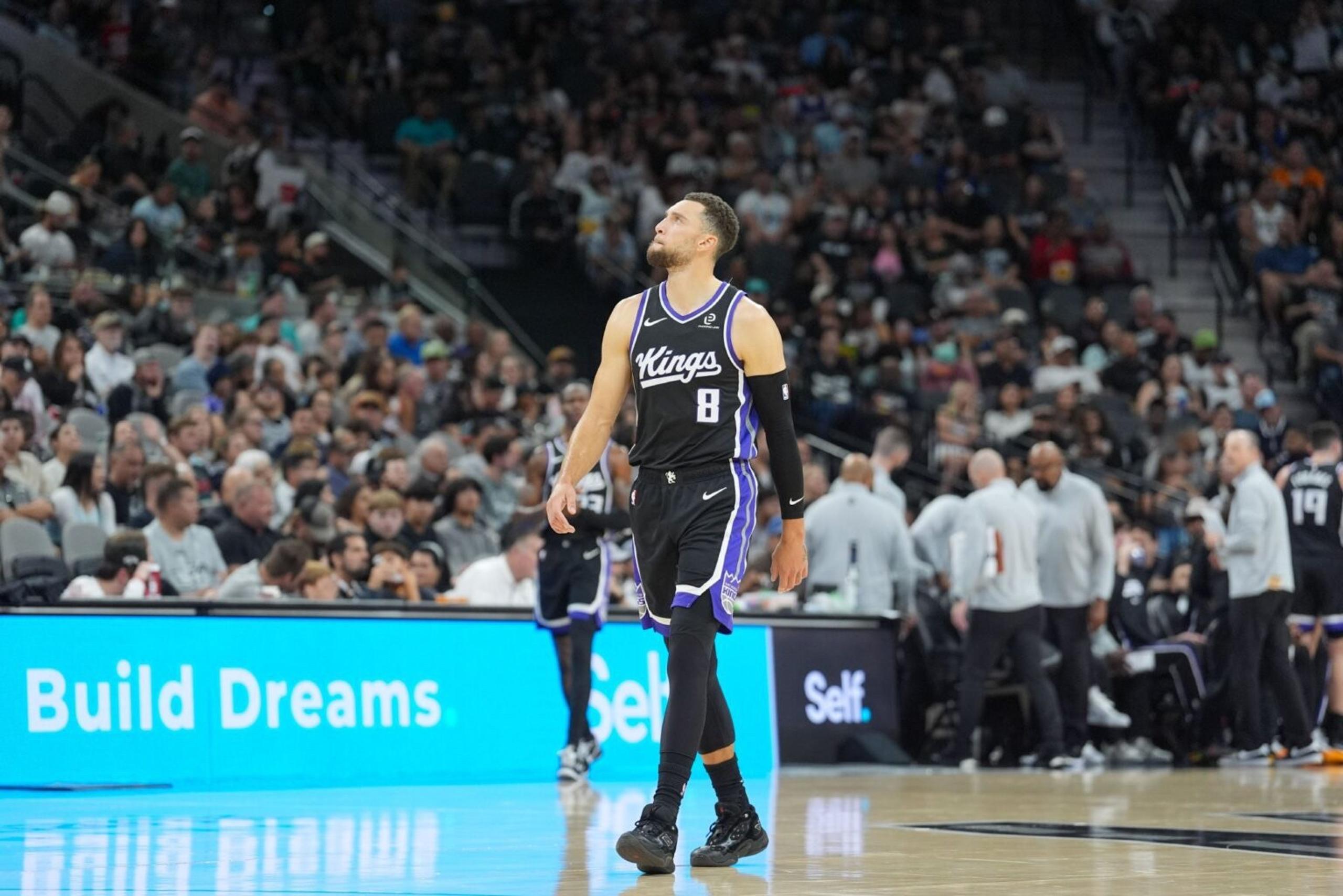 Nov 16, 2025; San Antonio, Texas, USA; Sacramento Kings guard Zach LaVine (8) walks up the court in the first half against the San Antonio Spurs at Frost Bank Center. Mandatory Credit: Daniel Dunn-Imagn Images