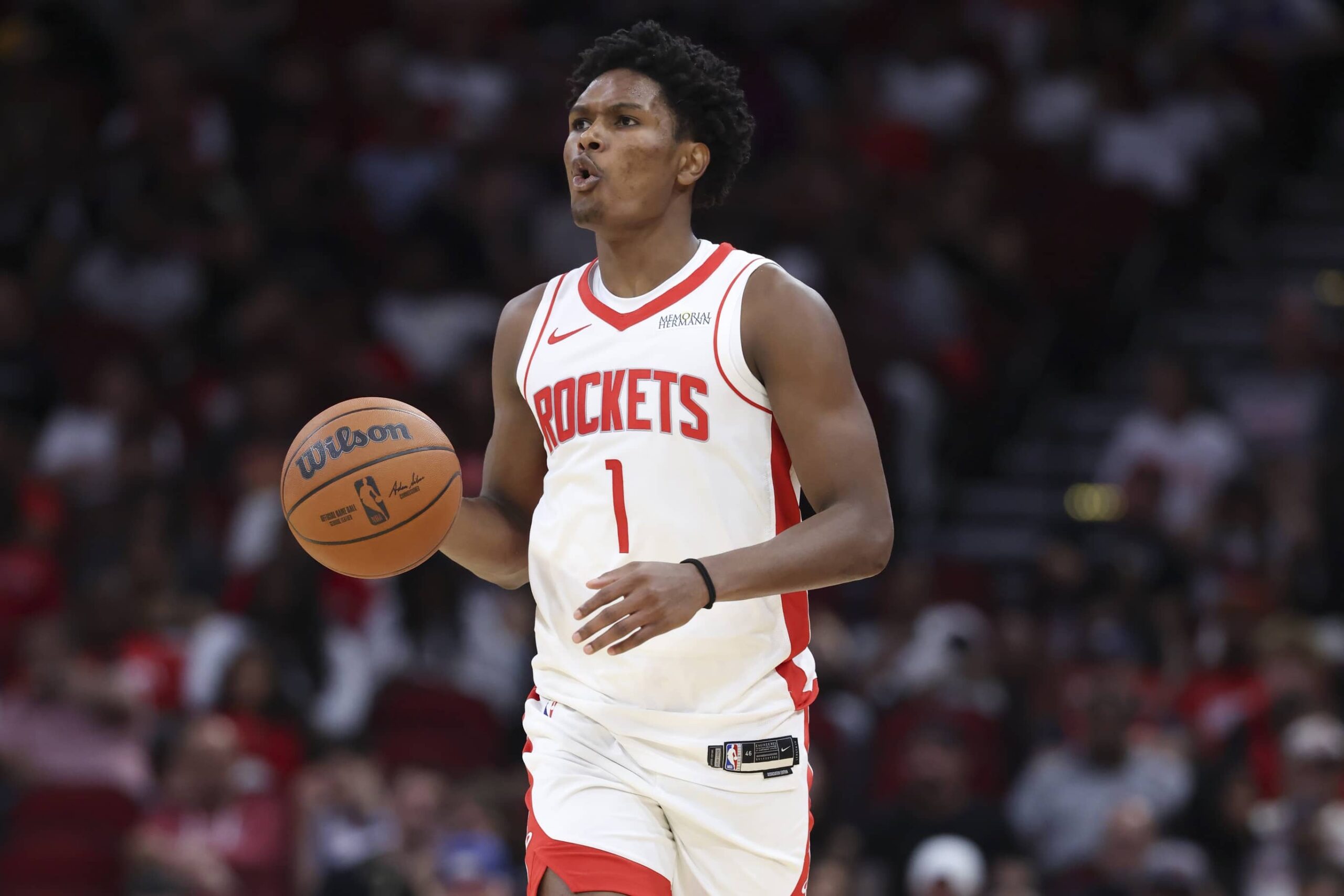Houston, Texas, USA; Houston Rockets guard Amen Thompson (1) dribbles the ball during the second quarter against the Atlanta Hawks at Toyota Center. Mandatory Credit: Troy Taormina-Imagn Images