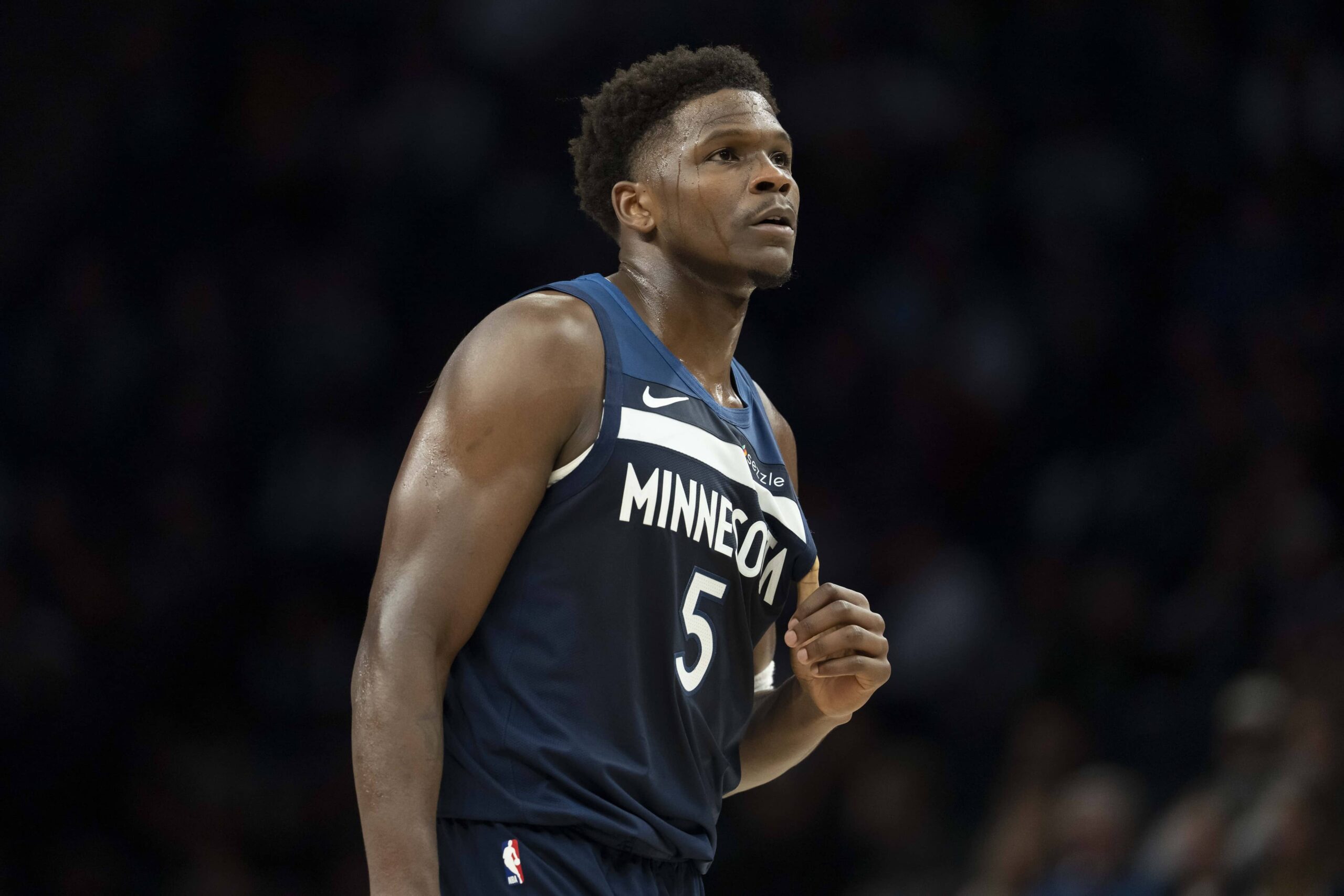 Minneapolis, Minnesota, USA; Minnesota Timberwolves guard Anthony Edwards (5) looks on against the Washington Wizards in the first half at Target Center. Mandatory Credit: Jesse Johnson-Imagn Images