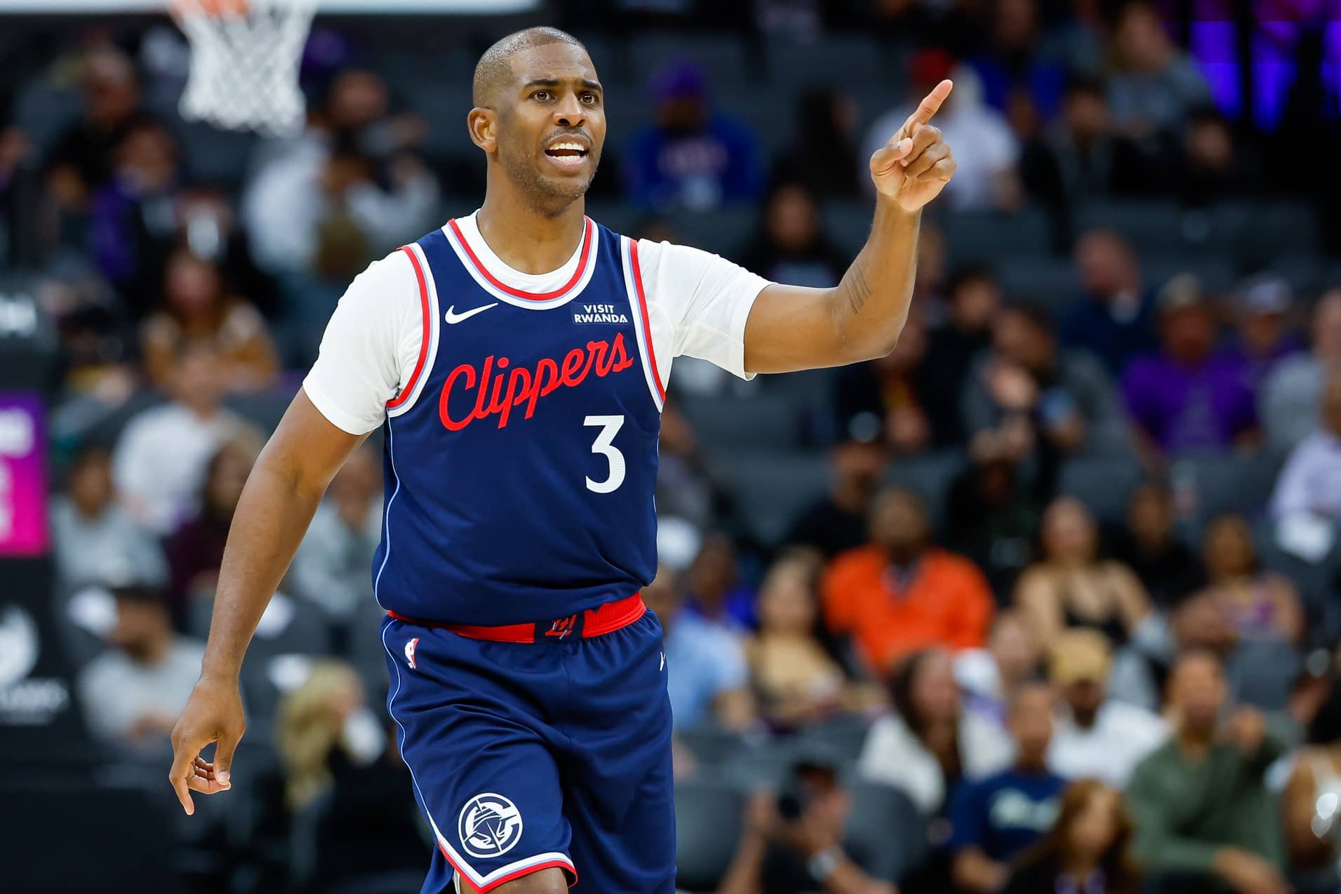 Sacramento, California, USA; Los Angeles Clippers guard Chris Paul (3) gestures towards a teammate during the third quarter against the Sacramento Kings at Golden 1 Center. Mandatory Credit: Sergio Estrada-Imagn Images