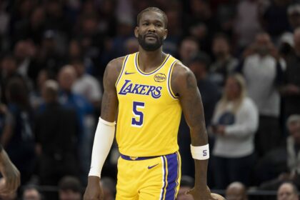 Minneapolis, Minnesota, USA; Los Angeles Lakers center Deandre Ayton (5) looks on against the Minnesota Timberwolves in the first half at Target Center. Mandatory Credit: Jesse Johnson-Imagn Images