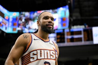 Dallas, Texas, USA; Phoenix Suns forward Dillon Brooks (3) looks on during the second half against the Dallas Mavericks at the American Airlines Center. Mandatory Credit: Jerome Miron-Imagn Images