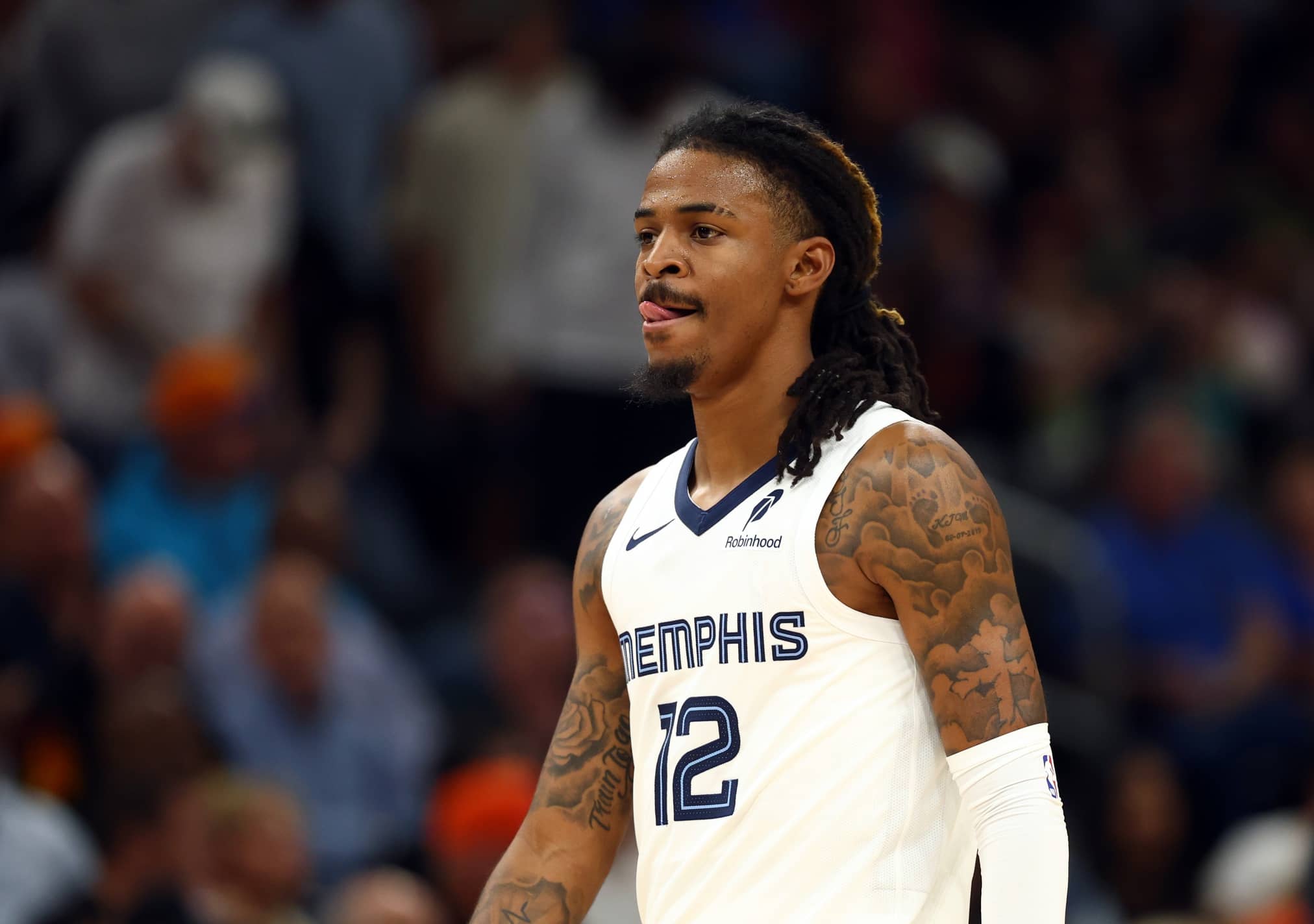 Phoenix, Arizona, USA; Memphis Grizzlies guard Ja Morant (12) against the Phoenix Suns at the Mortgage Matchup Center. Mandatory Credit: Mark J. Rebilas-Imagn Images