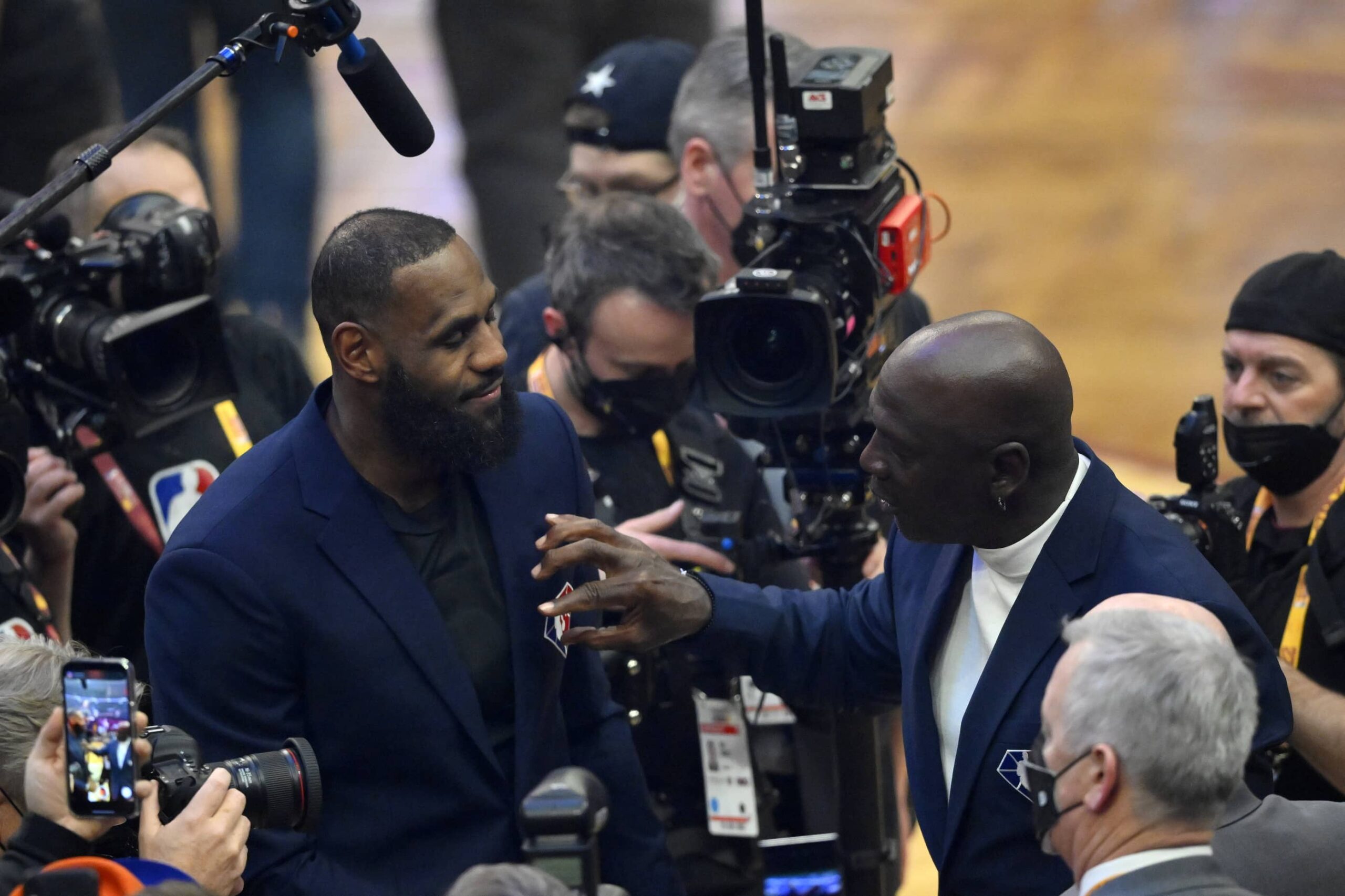 Cleveland, Ohio, USA; Lebron James and Michael Jordan on court during halftime during the 2022 NBA All-Star Game at Rocket Mortgage FieldHouse. Mandatory Credit: David Richard-Imagn Images