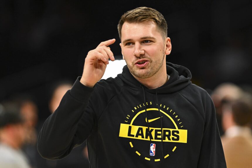 Los Angeles, California, USA; Los Angeles Lakers guard Luka Doncic (77) reacts before the game against the Miami Heat at Crypto.com Arena. Mandatory Credit: Jonathan Hui-Imagn Images