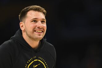 Los Angeles, California, USA; Los Angeles Lakers guard Luka Doncic (77) reacts before the game against the Miami Heat at Crypto.com Arena. Mandatory Credit: Jonathan Hui-Imagn Images