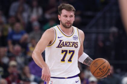 Salt Lake City, Utah, USA; Los Angeles Lakers guard Luka Doncic (77) brings the ball up the court against the Utah Jazz during the first half at Delta Center. Mandatory Credit: Rob Gray-Imagn Images
