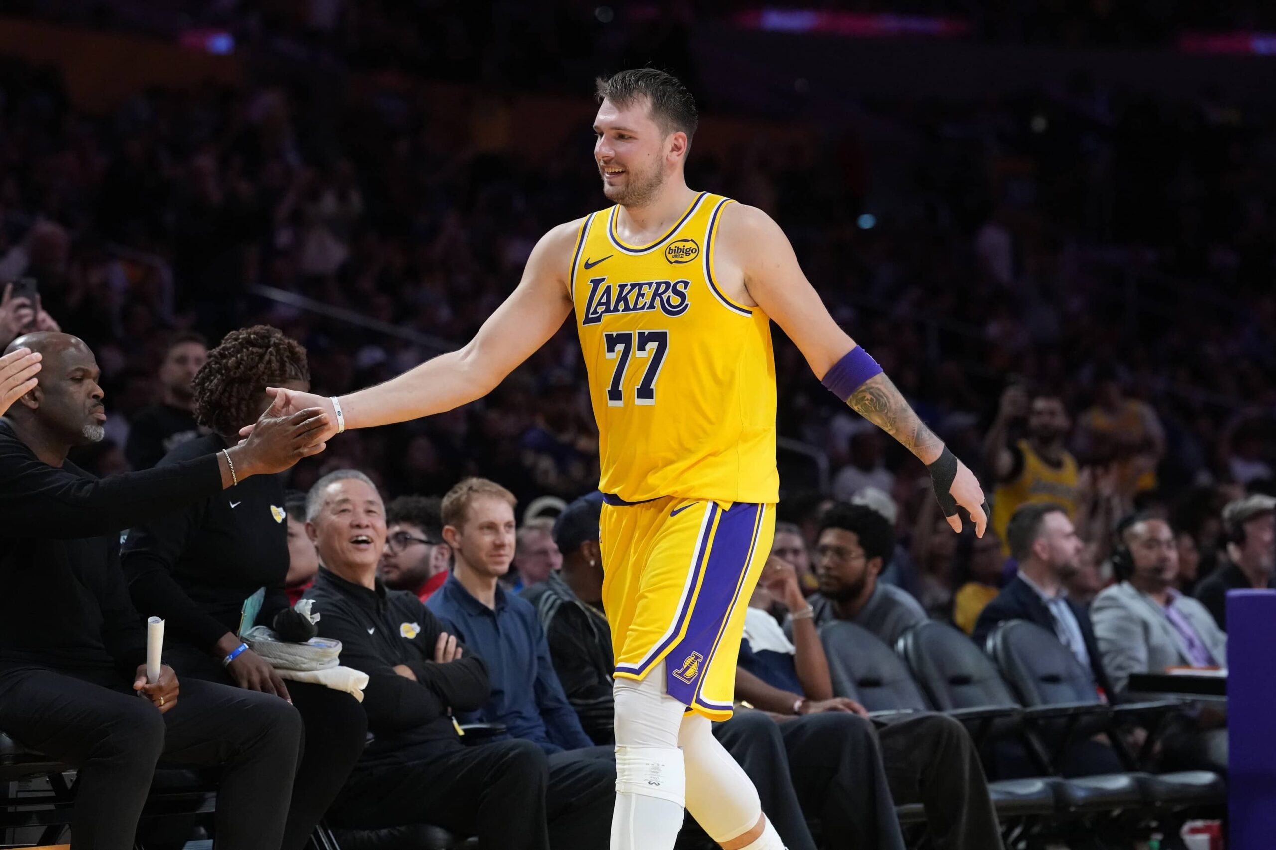 Los Angeles, California, USA; Los Angeles Lakers guard Luka Doncic (77) returns to the be3nch in the fourth quarteragainst the Minnesota Timberwolves at Crypto.com Arena. Mandatory Credit: Kirby Lee-Imagn Images