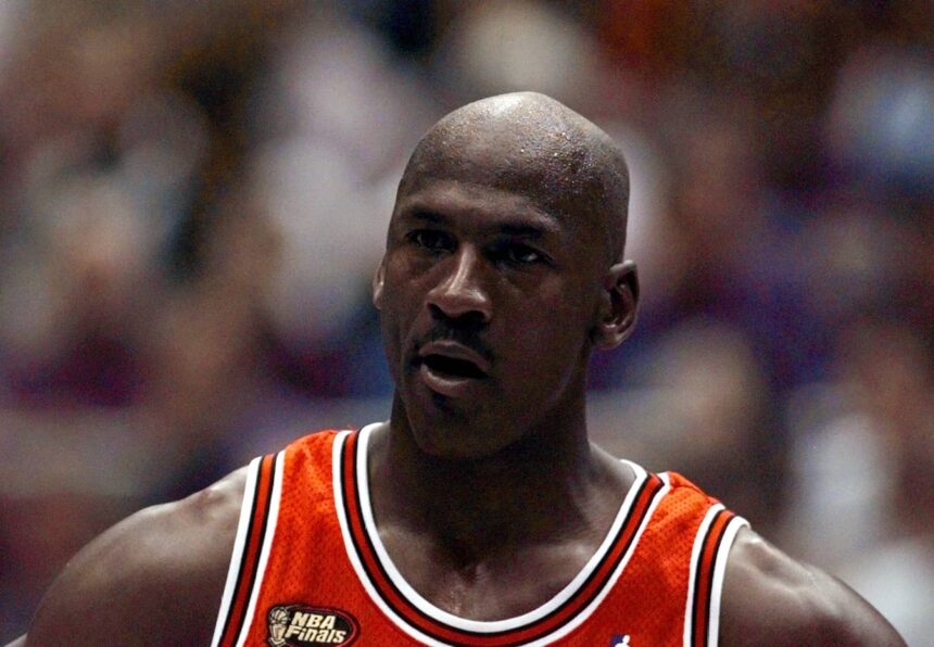 Salt Lake City, UT, USA; Chicago Bulls guard Michael Jordan in Game 2 of the 1998 NBA Finals against the Utah Jazz at the Delta Center. Mandatory Credit: Anne Ryan-USA TODAY