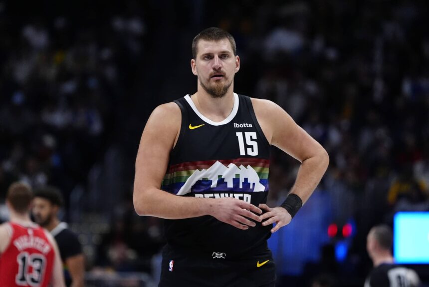 Denver, Colorado, USA; Denver Nuggets center Nikola Jokic (15) during the first quarter against the Chicago Bulls at Ball Arena. Mandatory Credit: Ron Chenoy-Imagn Images