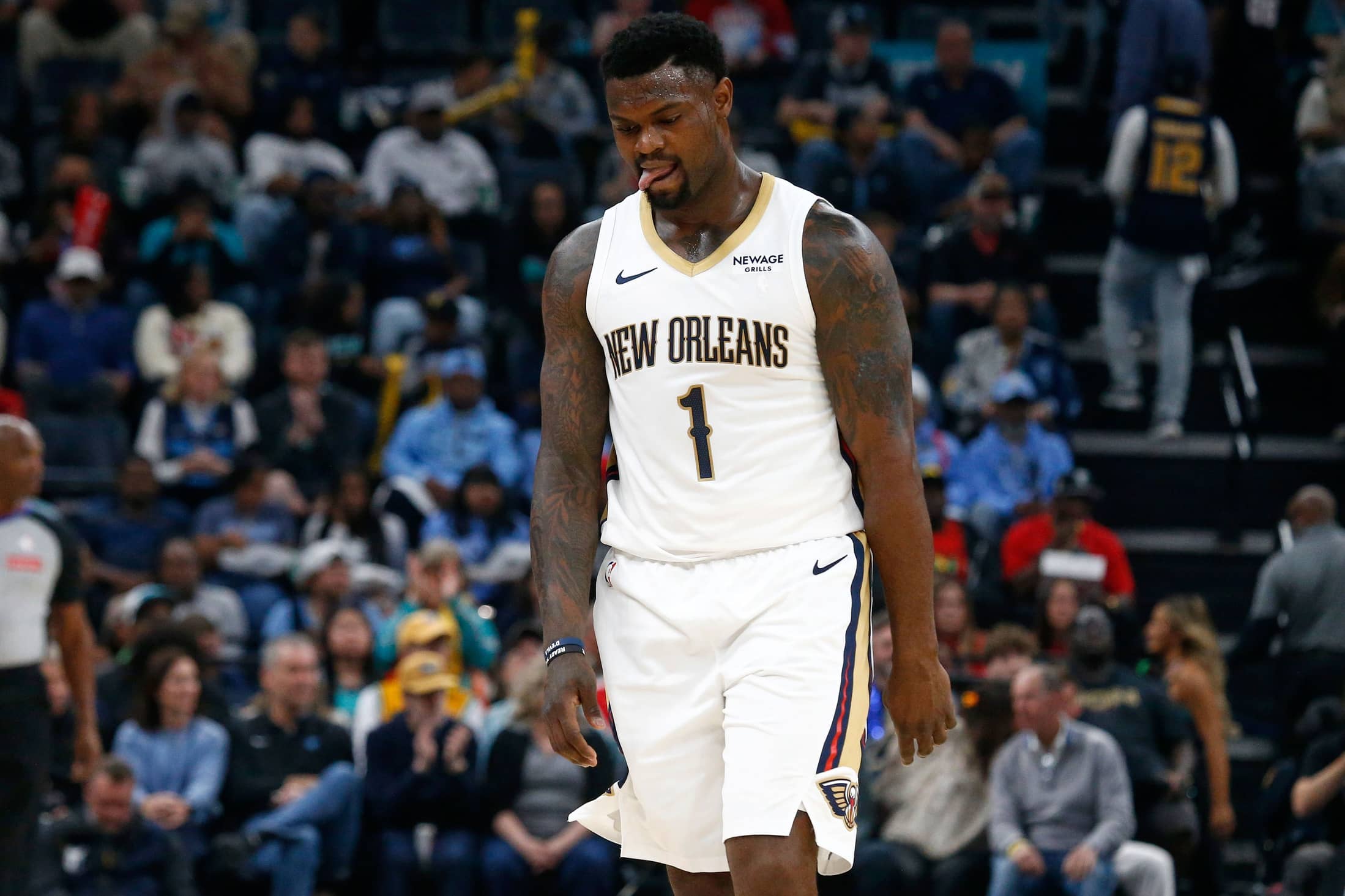 Memphis, Tennessee, USA; New Orleans Pelicans forward Zion Williamson (1) reacts during the first quarter against the Memphis Grizzlies at FedExForum. Mandatory Credit: Petre Thomas-Imagn Images