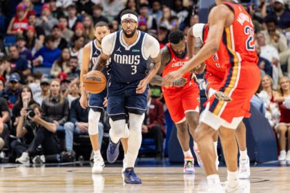 Dec 22, 2025; New Orleans, Louisiana, USA; Dallas Mavericks forward/center Anthony Davis (3) brings the ball up court against New Orleans Pelicans forward Trey Murphy III (25) during the first half at Smoothie King Center. Mandatory Credit: Stephen Lew-Imagn Images